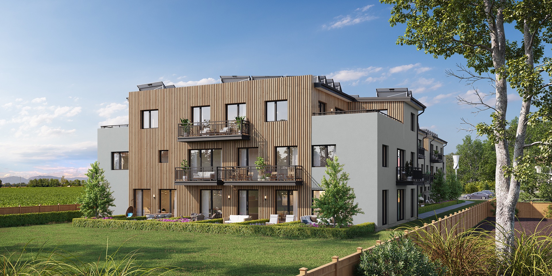 GreenPower Residence Nehvizdy — vizualizace bytového domu s fotovoltaikou a předzahrádkami